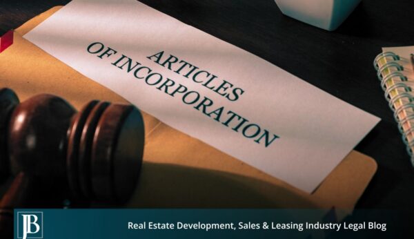 Articles of Incorporation document and gavel on a desk, illustrating Florida Series LLC formation under the new 2026 protected series law