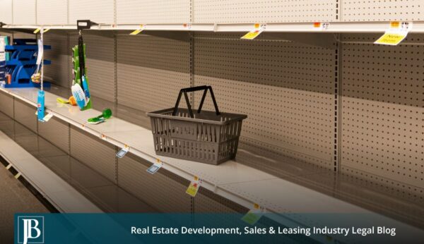 Nearly empty store shelves with a lone shopping basket, illustrating the lost income a Florida business damages claim can recover after a partial taking.