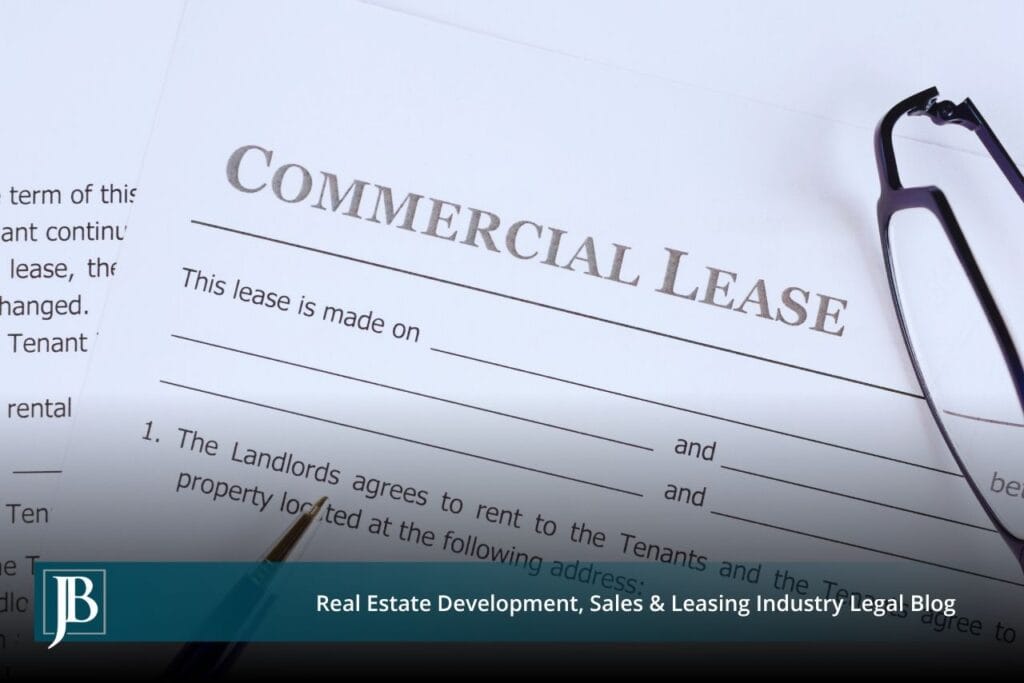 Signed Florida commercial lease agreement with reading glasses and pen, illustrating commercial lease disputes between landlords and tenants.
