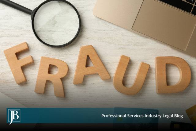 Wooden block letters spelling the word FRAUD on a white desk next to a magnifying glass, a laptop, and a credit card, illustrating an investigation into fraud allegations in Florida commercial litigation.