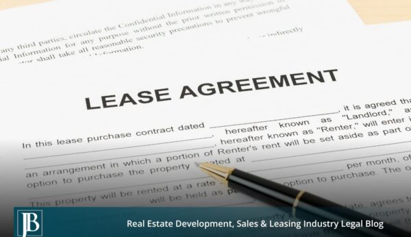 Signed commercial lease agreement with a pen resting on it, illustrating a Florida commercial lease dispute resolved without litigation.