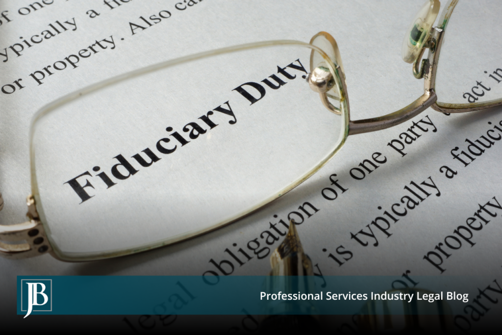 eading glasses and a fountain pen resting on a printed page defining fiduciary duty, illustrating a Florida business breach of fiduciary duty claim.