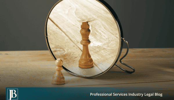 Wooden chess pawn reflected in a mirror as a king, illustrating alter ego liability when a Florida court looks past an LLC to the owner behind it.