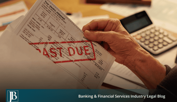 Hand holding a past due invoice next to a calculator, illustrating a Florida business owner deciding whether to sue on an unpaid invoice.