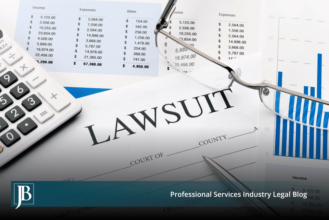 Lawsuit paperwork on a desk with a calculator and financial statements, showing how a lawsuit threatens your business operations.