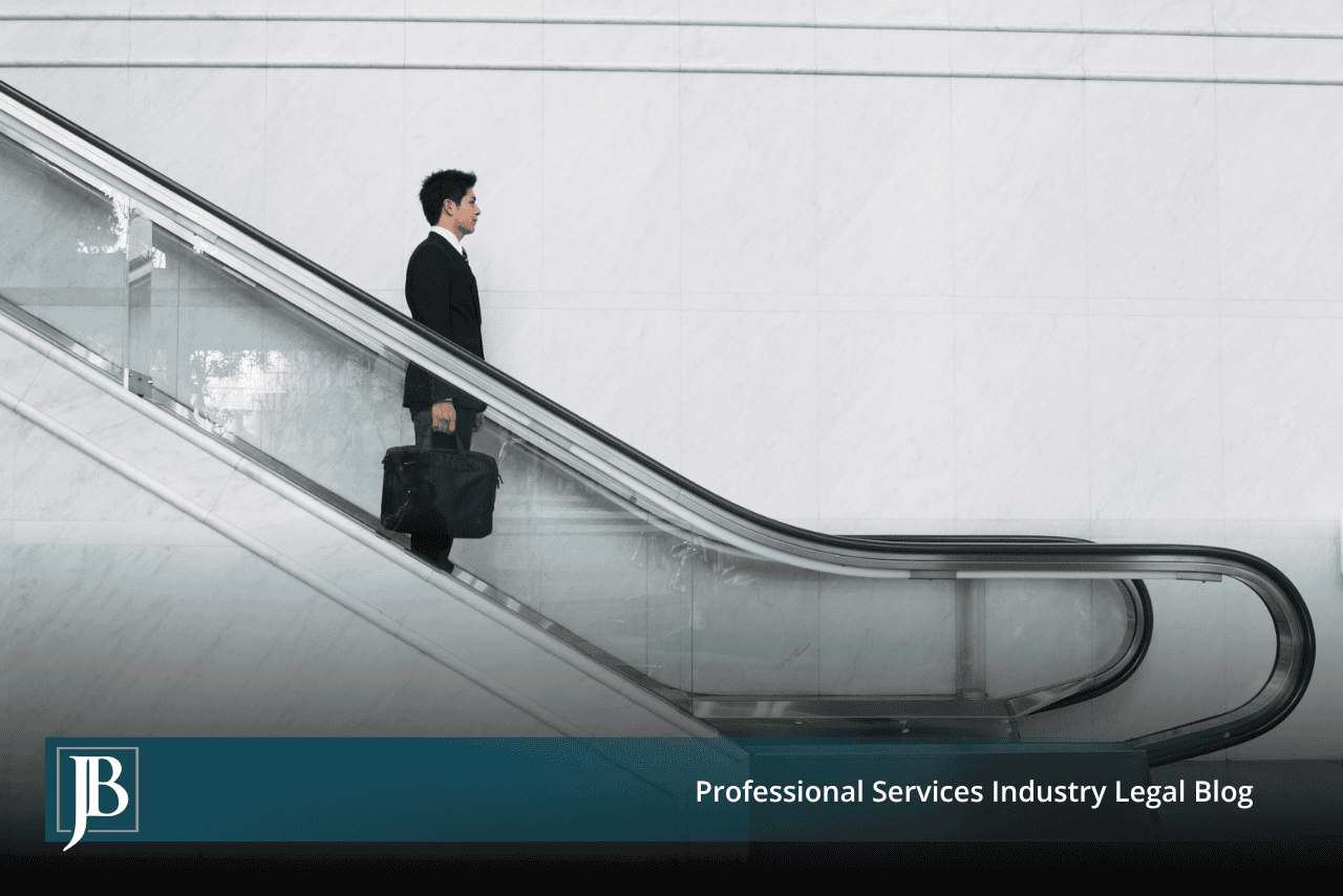 Businessman with a briefcase riding a down escalator, illustrating early moves that de-escalate competitive litigation