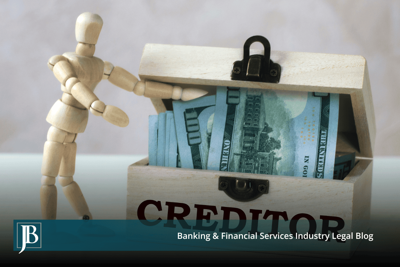 Wooden mannequin opening a chest marked CREDITOR full of $100 bills, illustrating a creditor reaching personal assets